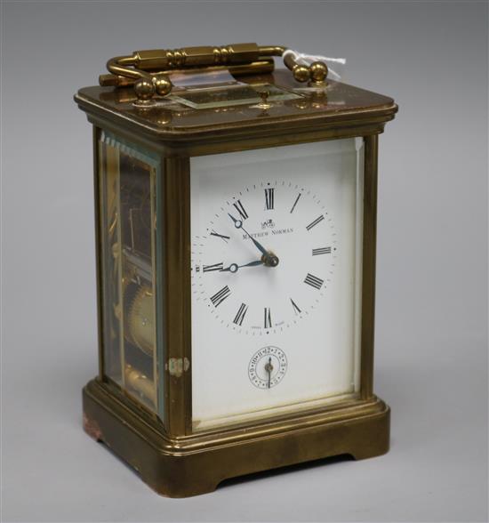 A gilt-brass carriage timepiece retailed by Matthew Norman, with subsidiary dial height 14cm